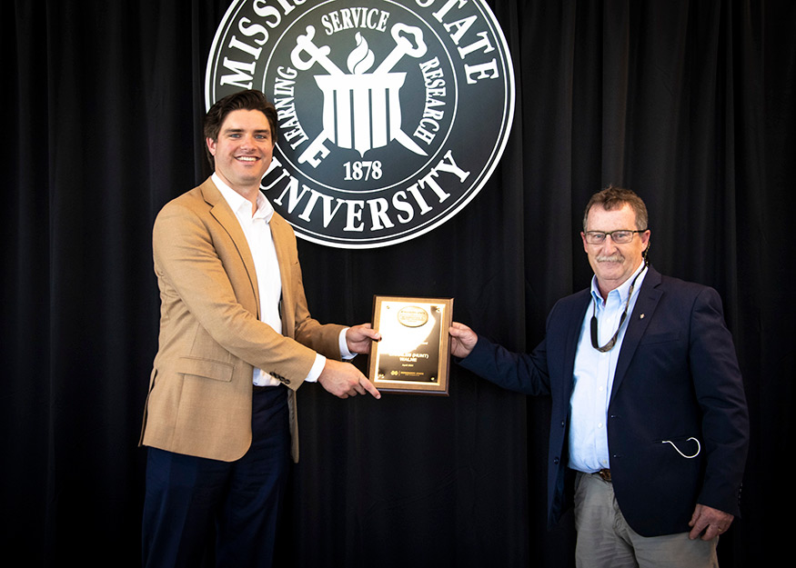 Charles “Hunt” Walne, Graduate Research Award winner, and Wes Burger