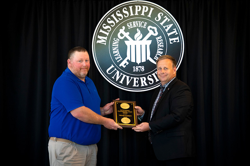 Trevor Garrett, CALS/MAFES Outstanding Professional Staff Award winner, and Scott Willard 