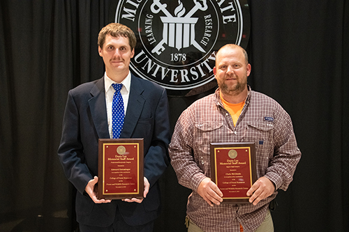 Edward Entsminger, research associate II, won the Doris Lee Memorial Outstanding Professional Staff Award, while Christopher McGinnis, building maintenance technician II, was selected for the Doris Lee Memorial Outstanding Support Staff Award. (Photo by David Ammon)
