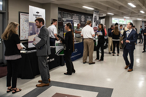 A wide shot of students and employers at Humphrey Coliseum during MSU’s Career Days, now known as the Career Expo