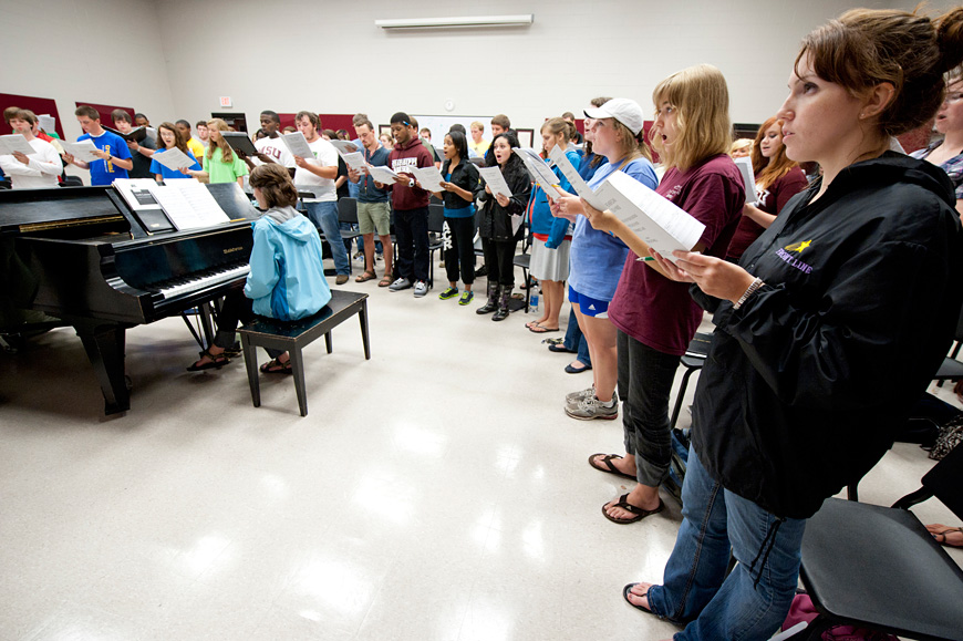 Mississippi State choir members rehearse at the university’s Band and Choral Hall. (Photo by Megan Bean)