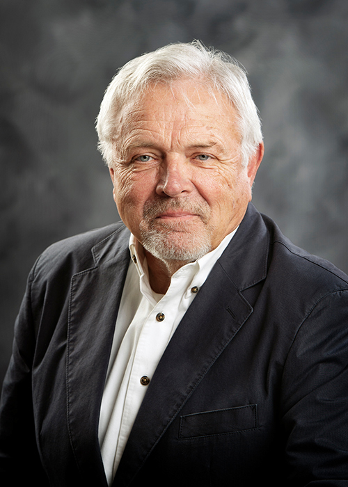 Studio portrait of Mark Clark