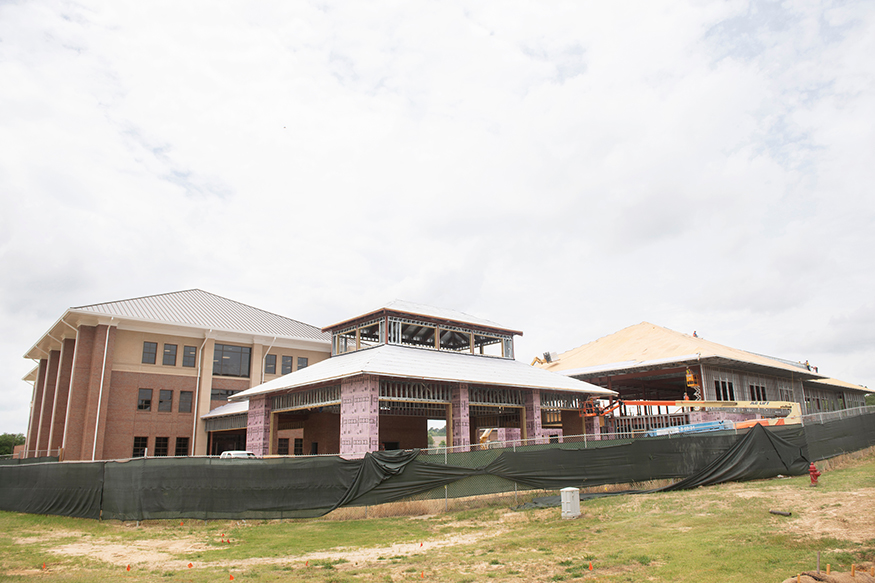 At the corner of Blackjack Road and Stone Boulevard, construction crews are building a new facility for Mississippi State’s Department of Animal and Dairy Sciences, left, and Department of Poultry Science, right. The corner building will connect both departments. The project is one of many capital improvement projects underway on the MSU campus. (Photo by Beth Wynn)