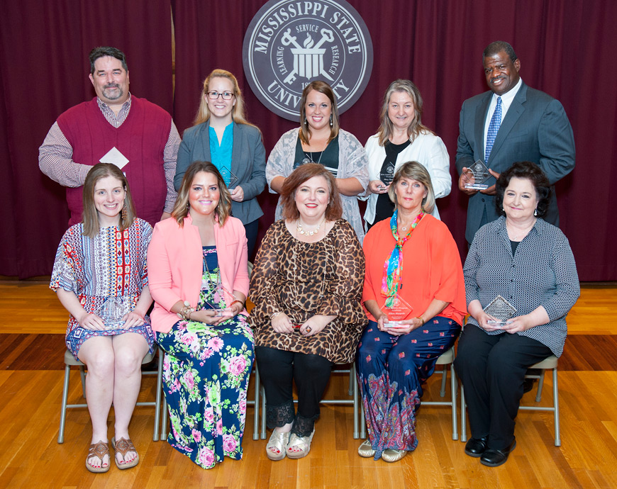 MSU’s newest Departmental Administrator Working Group graduates are Natalie Smith (front, l-r), Holly Coker, DAWG program director LeLe Newell, Ellen Harpole and Janet Petty; and Andrew Fox (back, l-r), Madison Poole, Casey Moss, Mary Thomas and Carl Smith. Not pictured: Judy Norwood and Jeremiah Elliott. (Photo by Russ Houston)