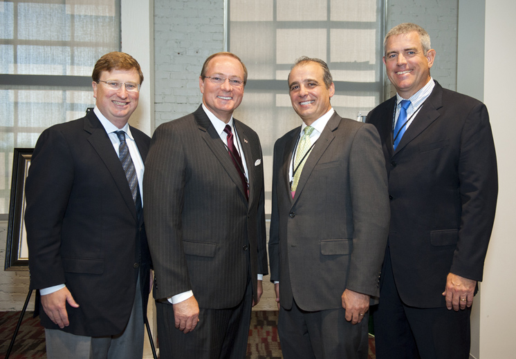 Mississippi Lt. Gov. Tate Reeves, MSU President Mark E. Keenum, NSPARC Executive Director Domenico “Mimmo” Parisi, and Mississippi Speaker of the House Philip Gunn pose for a picture following Reeves’ keynote speech at the inaugural ‘Mississippi – A Data Driven State’ summit, held at Mississippi State University. (Photo by Russ Houston)