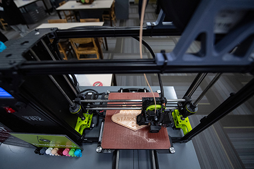The Lulzbot Taz 6, a 3D printer, printing the StarkVegas sign