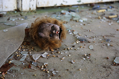 “Doll Head” by Jenna Todd is part of her series that captures details left behind in abandoned structures. (Submitted/by Jenna Todd)