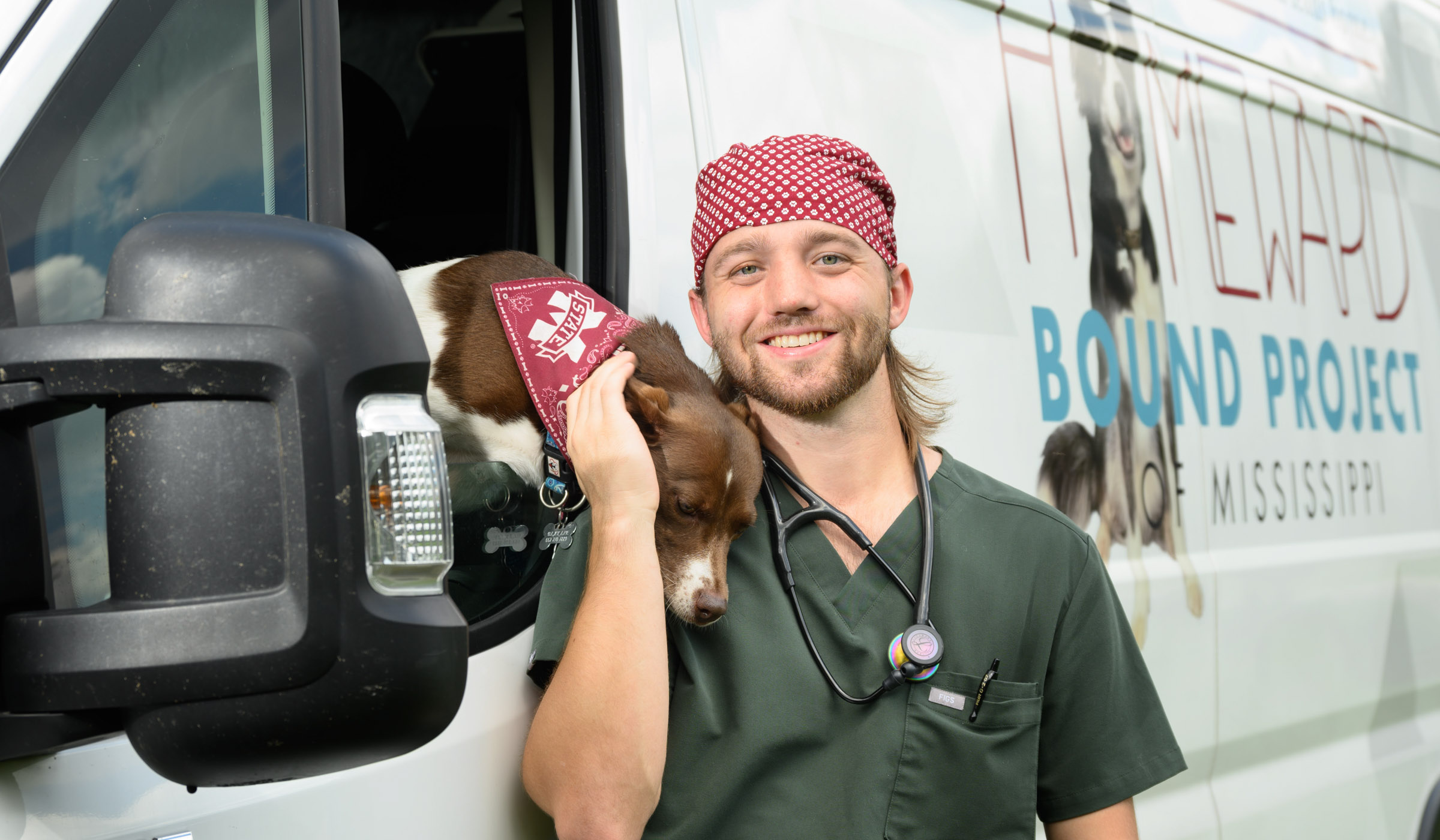 Ian Evans, pictured holding a dog.