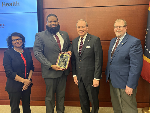 Antonio Gardner is presented with a 2023 IHL Diversity Award.