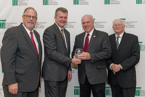 George Hopper, third from left, Mississippi Agricultural and Forestry Experiment Station director and College of Agriculture and Life Sciences dean at Mississippi State University, accepted the 2017 Southern Association of Agricultural Experiment Stations Directors ESS Excellence in Leadership Award during the APLU’s recent annual meeting in Washington, D.C. Congratulating him are, from left to right, Gary Thompson, Experiment Station Section chair and associate dean for research and graduate education for Penn State’s College of Agricultural Sciences; Jay Akridge, provost and executive vice president for academic affairs and diversity at Purdue University; (Hopper); and Ian Maw, vice president of food, agriculture and natural resources at the Association of Public and Land-grant Universities. (Photo submitted)