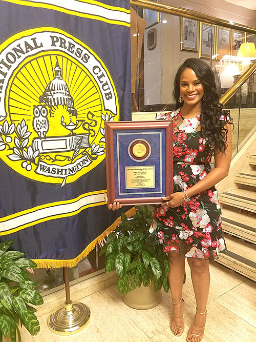 Germany Kent is pictured with her Sigma Delta Chi award from the Society of Professional Journalists at the National Press Club in Washington, D.C. (Photo submitted)