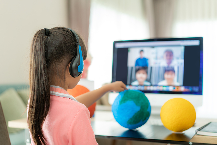 Stock image of a student in a virtual class setting