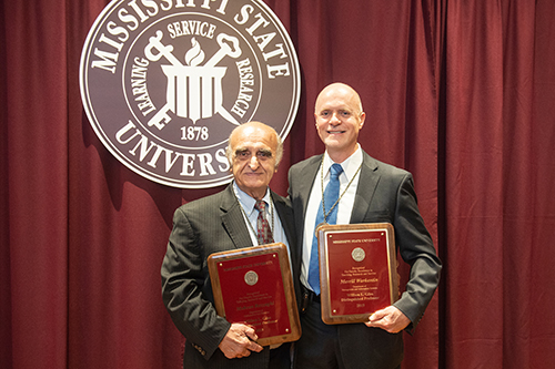 Mohsen Razzaghi, left, and Merrill Warkentin are Mississippi State’s newest William L. Giles Distinguished Professors. Razzaghi serves as professor and head of the College of Arts and Sciences’ Department of Mathematics and Statistics; Warkentin, the James J. Rouse Endowed Professor of Information Systems in the College of Business. (Photo by Megan Bean)