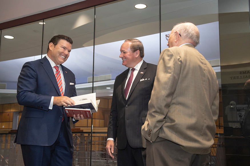 National journalist and bestselling author Bret Baier, left, talks with MSU President Mark E. Keenum, middle, and John F. Marszalek, Grant Association managing editor and executive director, during Baier’s June 2 visit to the Ulysses S. Grant Presidential Library at MSU. 