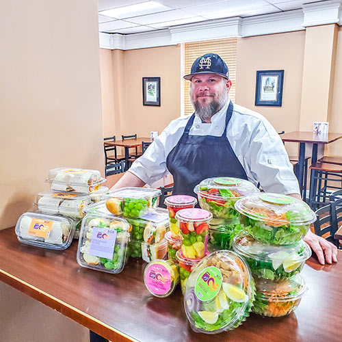 Chef Greg Huerkamp with Launch Box Grab & Go items