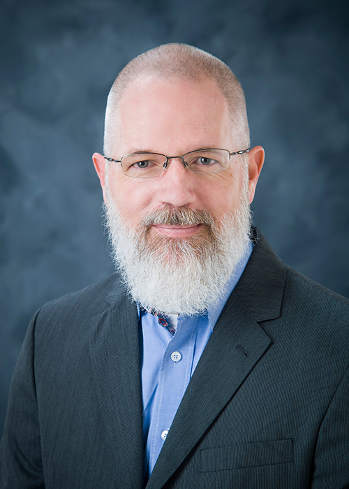 Studio portrait of Dr. Steven Grice