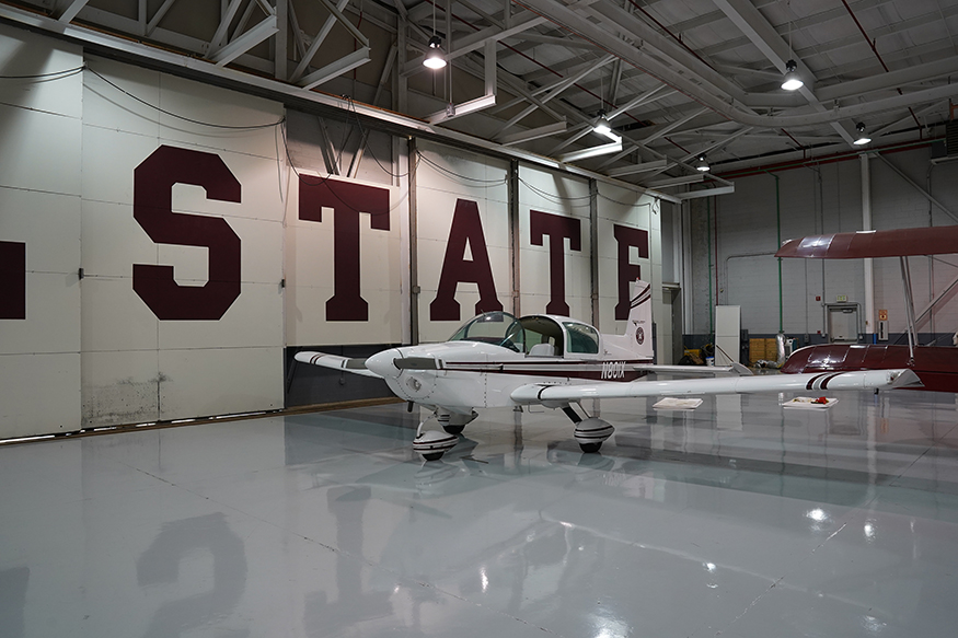 A Grumman airplane pictured in the Raspet Flight Research Lab hangar