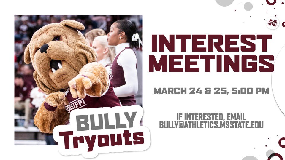 Bully mascot points at the camera while standing near MSU cheerleaders at an MSU sporting event