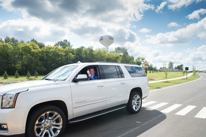 MSU President Mark E. Keenum takes the first official drive down Hail State Boulevard, the new 3.5-mile road that connects Blackjack Road to Poorhouse Road, enhancing access to the south end of MSU’s campus and improving traffic flow. (Photo by Megan Bean)