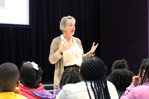 Shelly Hollis speaks during a 2019 Hour of Code Event