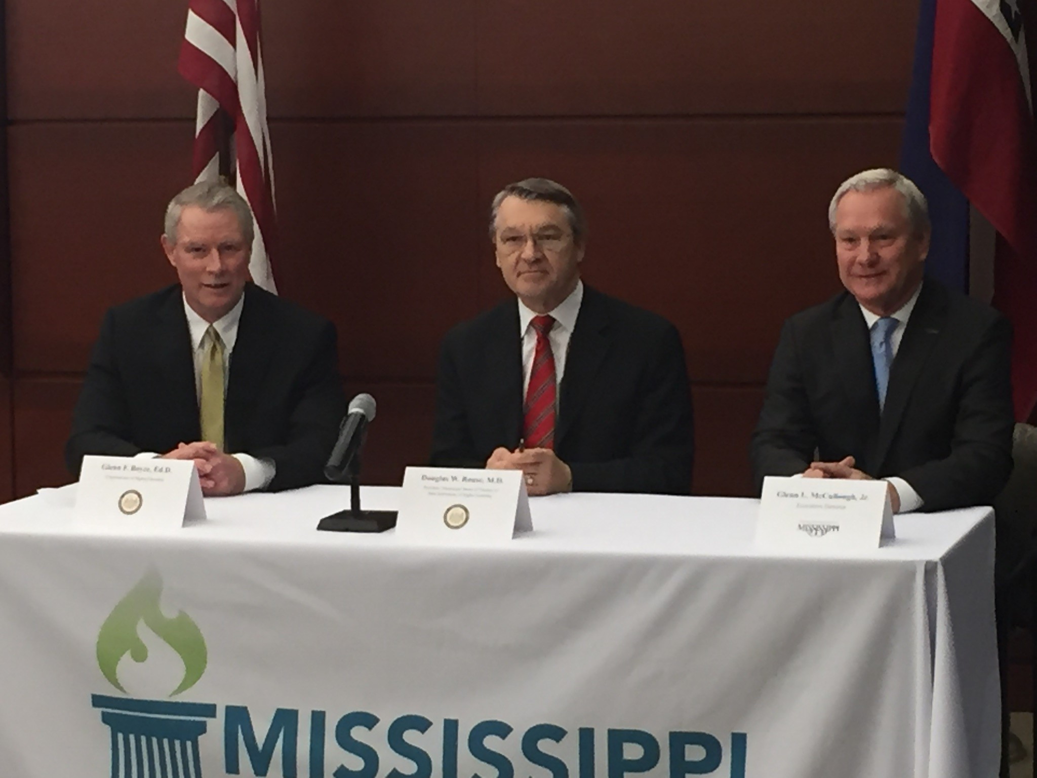 Dr. Glenn Boyce, Commissioner of Higher Education; Dr. Douglas W. Rouse, President, Mississippi Board of Trustees of State Institutions of Higher Learning; and Glenn McCullough, Jr., Executive Director, Mississippi Development Authority.