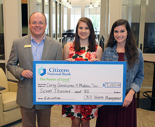 President of Citizens National Bank, Hampton Thames; MSU-Meridian students Carly Gensheimer (center), a communication major from Union, and Madison Tew, an elementary education major from Meridian. (Photo by Lisa Sollie) 