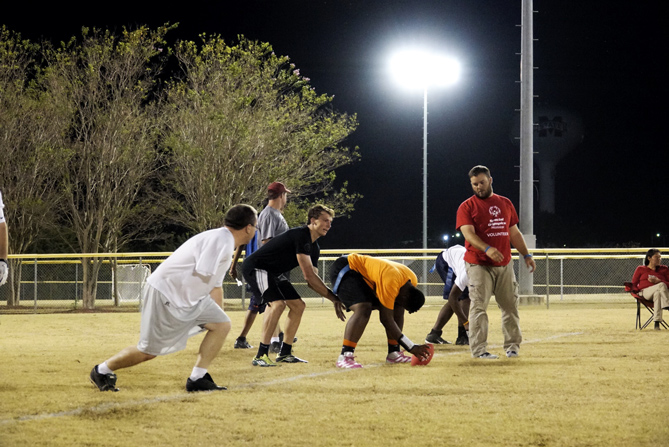 The MSU Unified Egg Bowl team practices for Monday’s game against the University of Mississippi. The game is a fundraiser for Special Olympics Mississippi. (Photo by Chase Neal) 