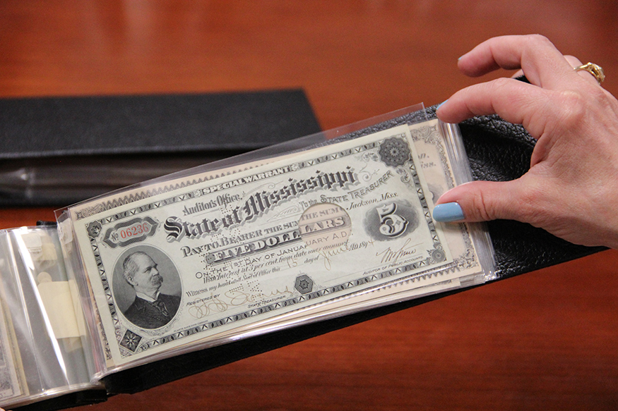 This piece of Mississippi currency from 1894 is among the many types of money found in a collection that is now housed in MSU Libraries. (Photo by Emily Daniels)