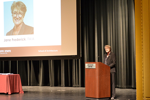 Jane Frederick, former American Institute of Architects president, speaks to graduating MSU School of Architecture seniors and their families in Lee Hall's Bettersworth Auditorium.