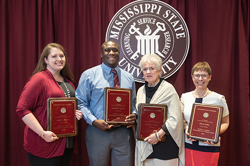 Honorees at MSU's Faculty Awards and Recognition Reception include, from left to right, Amie Russell, faculty recipient of the Irvin Atly Jefcoat Excellence in Advising Award; Jermaine Jackson, staff recipient of the Wesley A. Ammon Outstanding New Academic Advisor Award; Sandra Powe, staff recipient of the Irvin Atly Jefcoat Excellence in Advising Award; and Kasia Gallo, faculty recipient of the Wesley A. Ammon Outstanding New Academic Advisor Award. (Photo by Megan Bean)