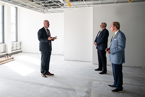 Mississippi State President Mark E. Keenum, right, listens to details on the renovation of the Rosenbaum Health Sciences Building at MSU-Meridian from Terry Dale Cruse, left, associate vice president and head of campus. Also touring the facility with Keenum and Cruse was Bob Luke, center, of LPK Architects in Meridian, the architectural firm for the project, which will include one of the most advanced interprofessional simulation centers in the state. 