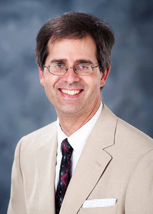 Studio portrait of Jason Keith