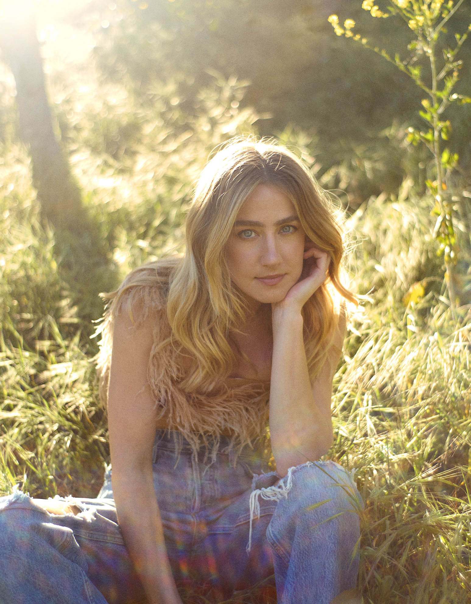 Photo of Ingrid Andress sitting outdoors