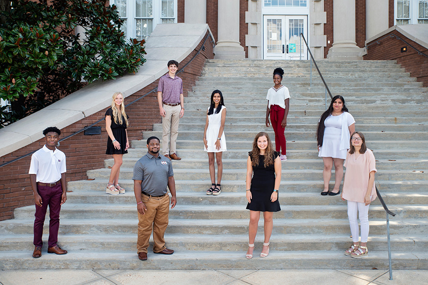 Luckyday Scholars pictured on the steps of Lee Hall.