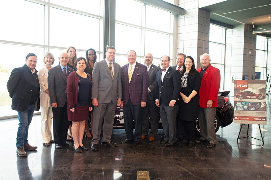 Officials celebrate an ARC grant.