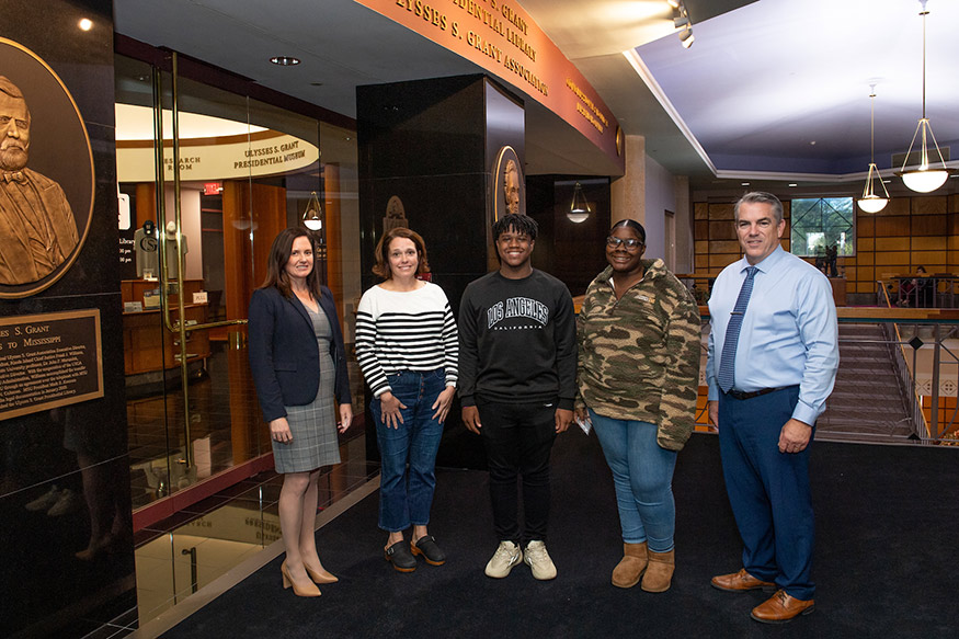 Pictured left to right: MSU Professor and Dean of Libraries Lis Pankl; Oxford High School Librarian Amanda Osborne; OHS students Nick Gordon and Tahana McNeil; and Associate Vice President for Academic Affairs Jim Dunne. 