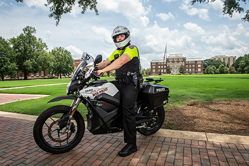 MSU Police Officer Michael Dover is pictured on a new electric motorcycle that is an addition to the MSU Police Department’s patrol vehicles. Chief of Police Vance Rice said two new electric motorcycles will allow additional resources for fast response while supporting campus sustainability goals. (Photo by Logan Kirkland) 