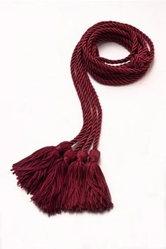 Maroon graduation cord on a white background