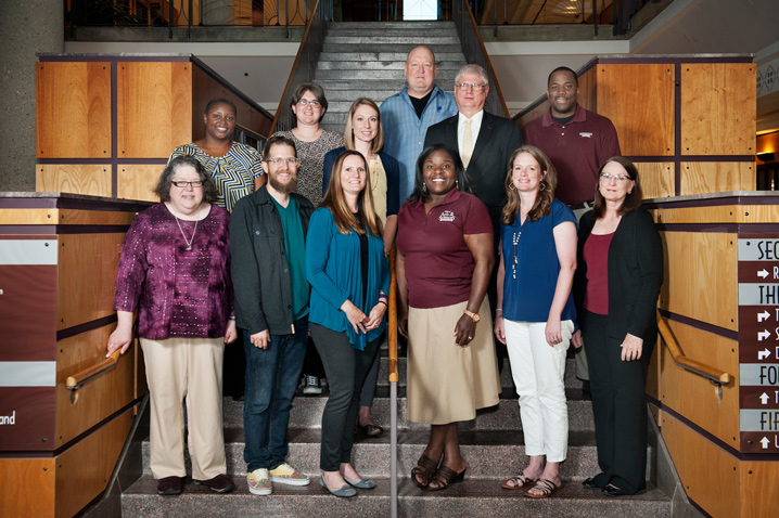 More than a dozen MSU faculty members are new graduates of a summer program designed to help them better incorporate writing strategies into class assignments. They include (front, l-r) Joanne Beriswill, Brian Counterman, Martha Barton, Kenya McKinley, Kim Smith and Gail Kopetz; (back, l-r) LaShan Simpson, Lesley Strawderman, Christine Cord, Jeffrey Haupt, Robert Green and Byron Williams. Not pictured is Holli Seitz. (Photo by Megan Bean)