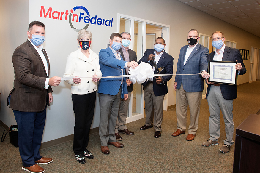 MSU, Starkville and MartinFederal leaders cut a ribbon in the company's new office space