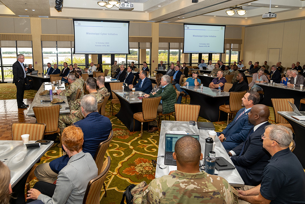 Jim Martin speaks to full conference room at Keesler Air Force Base