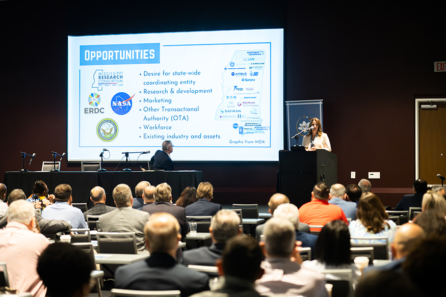 Sara Doss speaks during the Mississippi Aerospace and Defense Symposium.