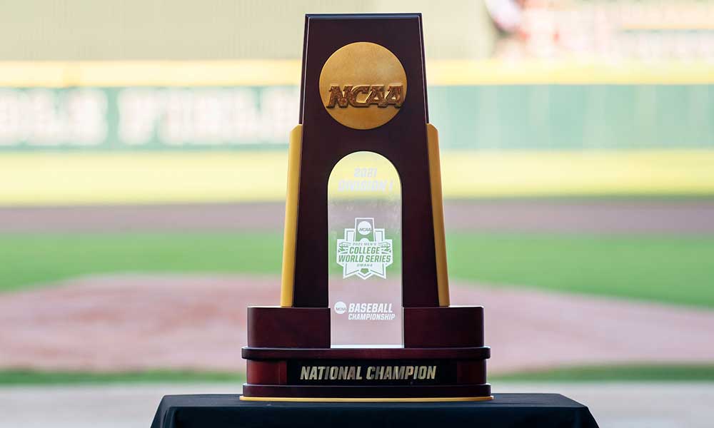 NCAA 2021 Division I Baseball National Championship trophy with Dudy Noble Field in the background