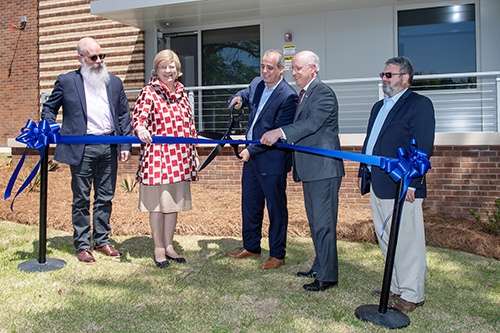 Mississippi State officials cut the ribbon to officially open the new NSPARC Data Center. Pictured, from left, are NSPARC Deputy Executive Director Steven Grice, MSU Provost and Executive Vice President Judy Bonner, NSPARC Executive Director Domenico “Mimmo” Parisi, MSU Vice President for Research and Economic Development David Shaw and NSPARC Associate Director of Information Technology Hal Bullock. (Photo by Beth Wynn)