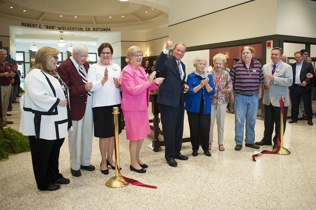 MSU hosted a ribbon cutting ceremony and open house Monday [Aug. 14] for the new 150,000-square-foot Old Main Academic Center. Pictured, from left to right, are Eupora-based architect Belinda Stewart; MSU Classics Professor Robert E. “Bob” Wolverton; MSU Vice President for Campus Services Amy Tuck; MSU Provost and Executive Vice President Judy Bonner; MSU President Mark E. Keenum; MSU Dean of Libraries Frances Coleman; Catherine Boyd; Louis Burns Brock; and MSU Associate Dean of Libraries Stephen Cunetto. (Photo by Russ Houston).