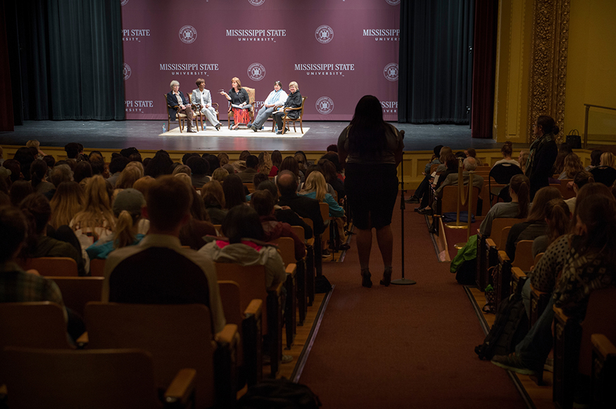 An audience member stands at a microphone to ask panelists a question during the well-attended “Women’s Leadership in the Rural South” discussion at Bettersworth Auditorium in MSU’s historic Lee Hall. (Photo by Megan Bean)