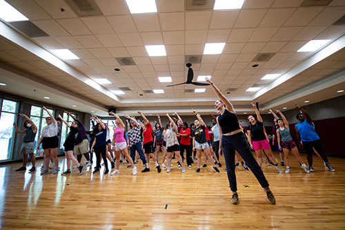Jonette Shurden, choreographer and dance instructor for Summer Scholars Onstage, leads a rehearsal in a Sanderson Center studio during the production camp this week at MSU. 