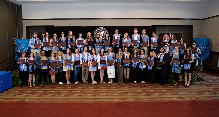 A large group of Phi Beta Kappa inductees pose for a group photo