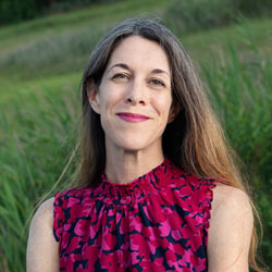 Catherine Pierce in a pink and black dress