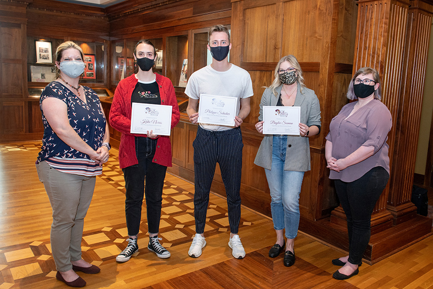 Pictured in the John Grisham Room at MSU’s Mitchell Memorial Library are Corinne Kennedy, Katherine E. “Katie” Norris, Philippe C. Schicker, Baylee M. Seeman and Kathryn "KC" New